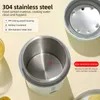 Close-up view of a portable electric kettle's interior and exterior, highlighting its materials and features. Produktbild-Vorschau