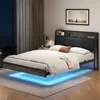 A modern bedroom with a bed featuring integrated LED lighting. Produktbild-Vorschau