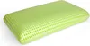 A light green pillow with a perforated surface is shown against a white background. Produktbild-Vorschau