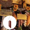 A market stall selling cured meats and other food items, with a close-up inset of a sausage pendant. Produktbild-Vorschau