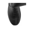 A close-up view of the toe of a black leather boot. Podgląd zdjęcia produktu