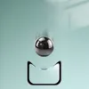 A metallic sphere is shown levitating above a stylized outline of a cat's ears, against a light blue background. Voir les images du produit