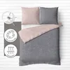 A bedding set laid out on a white wooden floor. Produktbild-Vorschau