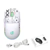 A white wireless gaming mouse with black graphic designs, along with its USB receiver and charging cable, is displayed on a white background. A small instruction manual is also visible. Produktbild-Vorschau