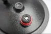 A close-up view of a pressure cooker valve. Náhľad obrázku produktu