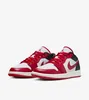 A pair of Nike Air Jordan 1 Low sneakers in a red and white colorway are displayed against a white background. Náhled obrázku produktu