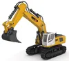 A yellow and white remote-controlled excavator toy is shown against a white background. Náhľad obrázku produktu