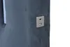 A close-up view of a USB charging port integrated into the side of a dark gray upholstered headboard. Produktbild-Vorschau
