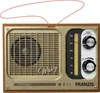 A vintage-style radio with a red antenna. Podgląd zdjęcia produktu