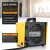A yellow and black heater is shown in a room under construction with a ladder in the background. Produktbild-Vorschau