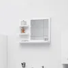 A white bathroom cabinet with a mirror and shelves, displaying a few toiletries. Náhled obrázku produktu