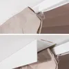 Close-up views of a white curtain rail with a beige fabric curtain attached. Anteprima dell’immagine prodotto