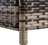 A close-up view of the woven texture and leg of a polyrattan storage box. Produktbild-Vorschau
