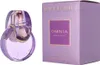 A perfume bottle and its packaging are displayed side-by-side against a white background. Podgląd zdjęcia produktu