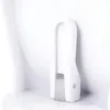 A close-up of a white shower footrest. Náhled obrázku produktu
