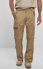 A person wearing khaki cargo pants with removable legs. Anteprima dell’immagine prodotto