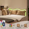 A bed with pillows and a remote control, with graphic overlays highlighting features. Anteprima dell’immagine prodotto