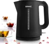 A black electric kettle is shown on the right side of the image, with three cups of tea on the left. The kettle has a water level indicator and the brand name 'DURONIC' is visible. Rose petals are scattered around the base of the kettle and cups. Produktbild-Vorschau