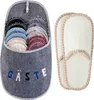 A gray felt slipper-shaped holder filled with multiple pairs of guest slippers, and a separate pair of white slippers with beige trim. Náhľad obrázku produktu