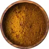A close-up overhead view of Cajun spice mix in a wooden bowl. Produktbild-Vorschau