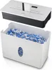 A paper shredder with its collection bin filled with shredded paper. Podgląd zdjęcia produktu