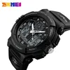 A close-up studio shot of a black SKMEI digital and analog watch against a white background. Produktbild-Vorschau