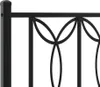 A close-up view of a black metal bed frame with decorative scrollwork. Náhled obrázku produktu