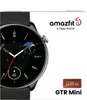 The image shows the packaging of an Amazfit GTR Mini smartwatch, with the watch face prominently displayed on the left side. Podgląd zdjęcia produktu