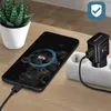 A Samsung fast charger is plugged into a power strip and charging a smartphone, with a small potted plant in the background. Produktbild-Vorschau
