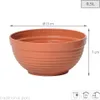 A terracotta-colored plant pot with dimensions indicated. Podgląd zdjęcia produktu