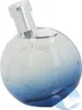 A round perfume bottle with a silver cap, set against a white background. Anteprima dell’immagine prodotto