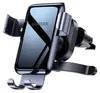 A close-up studio shot of a black and gray UGREEN gravity phone holder designed for car air vents. Náhled obrázku produktu