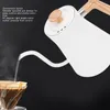 A white gooseneck kettle pouring water into a coffee filter with coffee grounds. Náhľad obrázku produktu