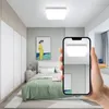 A bedroom scene with a hand holding a smartphone displaying a ceiling light. Anteprima dell’immagine prodotto
