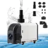 A submersible water pump with various attachments, shown in a studio setting with water effects. Náhled obrázku produktu
