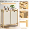 A laundry basket with two compartments and a top shelf, shown with product details and features highlighted. Voir les images du produit