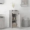 A bathroom cabinet with its door open, showing shelves with bottles and a basket, set against a marble-tiled wall. Náhľad obrázku produktu