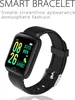A black smartwatch with a textured band is displayed against a white background. Text is overlaid on the image. Podgląd zdjęcia produktu