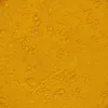 A close-up, textured view of yellow powder. Anteprima dell’immagine prodotto