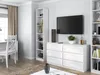 A brightly lit living room with white furniture and decor. Produktbild-Vorschau