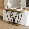 A console table with a lamp and flowers placed behind a white sofa in a living room. Podgląd zdjęcia produktu