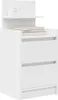 A white bedside table with two drawers and a small shelf on top, displaying a clock and two books. Náhľad obrázku produktu