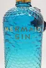 A close-up shot of a blue glass bottle of Mermaid Gin. Náhľad obrázku produktu