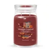 A Yankee Candle Autumn Daydream scented candle in a glass jar with a lid. Náhled obrázku produktu