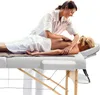 A massage therapist is giving a massage to a client on a massage table. Náhled obrázku produktu