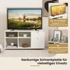 A white TV stand with a television on top and decorative items on shelves. Anteprima dell’immagine prodotto