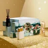 A winter-themed advent calendar with various beauty products displayed on a sparkly gold surface. Produktbild-Vorschau