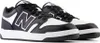 A pair of black and white New Balance sneakers. Podgląd zdjęcia produktu
