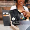 A person is using a phone with a wallet case to make a payment at a terminal. Produktbild-Vorschau