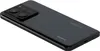 A black smartphone is shown from a diagonal angle, highlighting its camera module and branding. Podgląd zdjęcia produktu